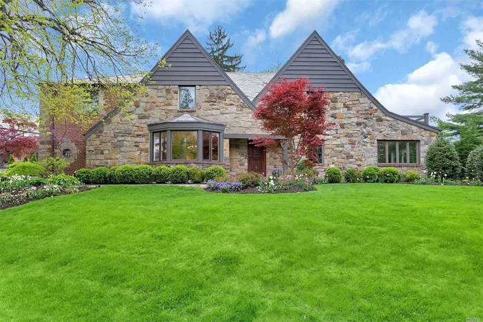 Architectural beauty! Majestic Tudor with modern flair. 6 Bedrooms/4 Bths. Completely renovated. Newly renovated basement, family room, new outdoor kitchen and fireplace, and all new landscaping and extensive outdoor lighting design. Deeded rights to Strathmore Vanderbilt Country Club.