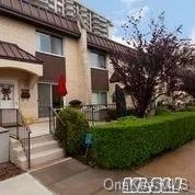 Gorgeous Sun filled Duplex 3 Bed, 2.5 Bath co-op in the most Desirable area of Queens, Bayside, NY. Townhouse; renovated quartz eat-in kitchen; 24 hour doorman at main building; includes beauty spa; deli;restaurant;grocery;cleaners;pool;tennis plus more.Total approx. maintenance .$1997.46;plus Utility 165.00; Assessment (energy) 73.21 ; Amv (maint f and garage) 250.00 equals $2459.67.24.  doorman@main bldg;includes beauty spa;deli, restaurant, grocery, cleaners;pool, gym, tennis, parking & Bay Terrace Shopping Center.