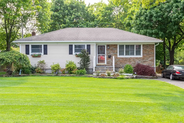 Beautiful Ranch features wood floors, sun room overlooking big beautiful yard, plantation shutters, stainless steel appliances and granite counter tops in kitchen. Bath has radiant flooring.