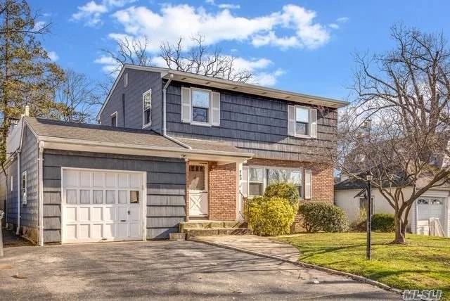 Beautiful spacious colonial in the heart of Woodmere close to shopping and transportation. Solar panels.