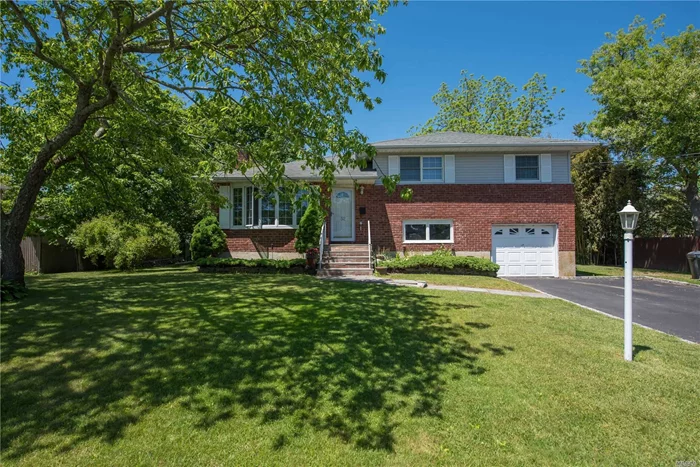 Best Priced Home South of Montauk. Spacious Side By Side Split. Living Rm & Formal Dining Rm w/Hardwood Floors. EIk, Master Suite w/Full Bath, Plus 2 Bedrooms W/Guest Full Bath.