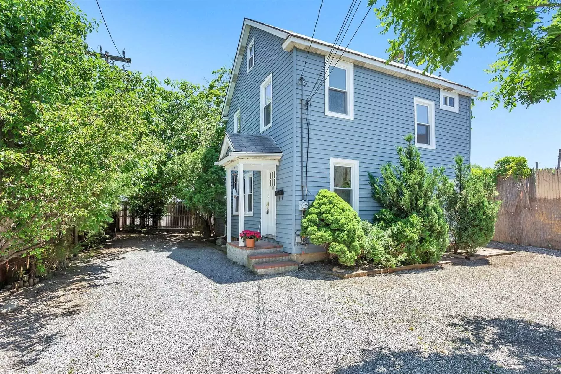 Wonderful home close to shops, town and LIRR. Flooded with light and filled with updates: new floors, new windows, new carpeting in the walk-up home office. 3 Bedrooms, 1 Full Bath, Formal Living room , Formal Dining room, Den with yard access. Quiet dead end street.