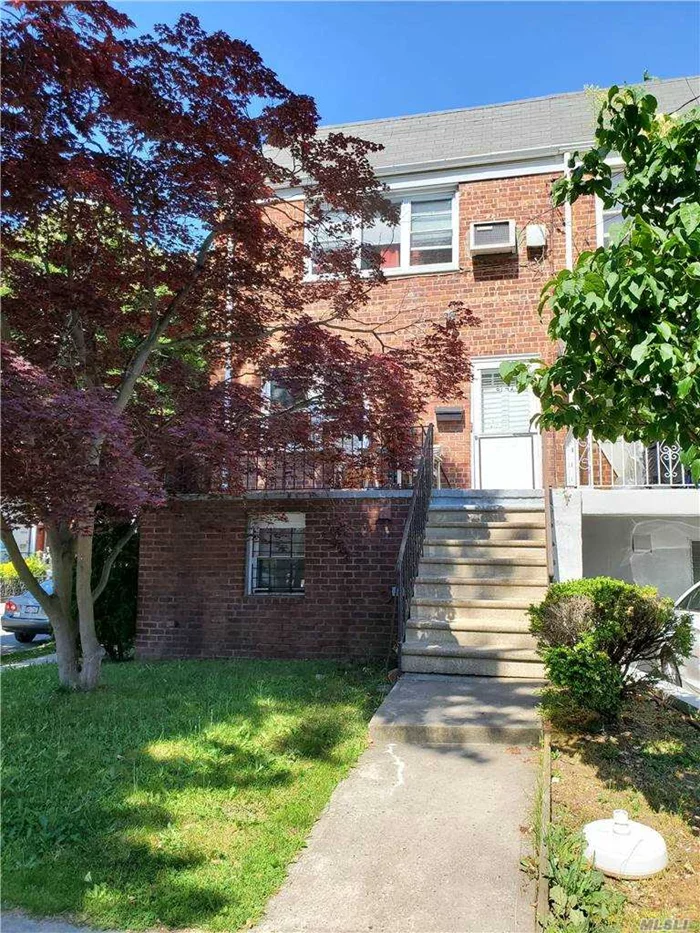 ONE of A KIND ! Semi - detached , CORNER , Brick Two family - INCOME PRODUCING home on a Sunny , Refreshing Block.   A spacious ONE BEDROOM APARTMENT OVER A 3 BEDROOM APARTMENT.  The layouts have Options to change to your needs.  A very UNIQUE home.  Front porch, Detached Garage,  Side yard,  Back yard for the perfect BBQ !   Walk To Main street Q-44 , manhattan shuttle buses ,  stores , supermarket and more !