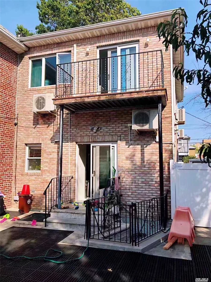 One-family 2-story brick house with front and back balcony for natural lighting, high ceiling finished basement, big backyard, garage and private driveway. Two Blocks from L.I.R.R. train station. Half a block to Q-12, Q-13 bus stops to Flushing on Northern Blvd.