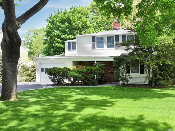 Roslyn Heights. Welcome to this perfectly situated 3 bedroom, 2.5 bath expanded colonial in the heart of Browers Hills. Featuring lovely front porch, entry hall, formal living room/dining room with fireplace, huge family room and eat-in kitchen. Wonderful deck for entertaining. All of this and more! Perfectly priced!