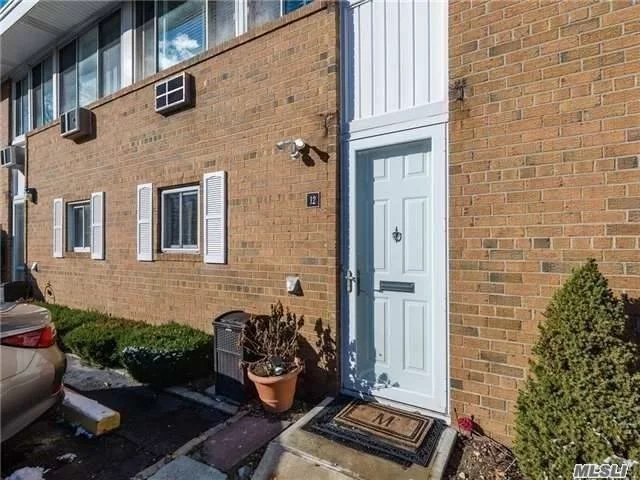 Sunny & Spacious Townhouse In SD#14. Gleaming Hardwood Floors, Includes 1 Parking Space right In Front Of Unit, Lovely Private Yard, Patio. Washer & Dryer In Unit, Granite Kitchen Counter, 2 Very Large Bedrooms, Very close to LIRR & shopping, Pet Friendly. Must see!!