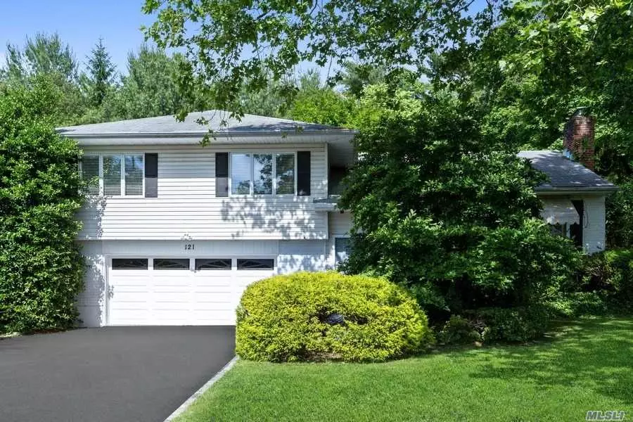 Spacious split level home on oversized property in the coveted Flower Hill section of Manhasset. 3 large bedrooms and 2 1/2 baths. Entry Foyer, Living Room with frplace, Frml DR, EIK and Large family room on first level,  Master Br with ensuite bath, 2 bedrooms and hall full bath on 2nd level. Ample sized family room with 1/2 bath on lower level with access to 2 car garage. The basement is full with utilities and laundry room. In close proximity to LIRR, shopping and transportation.. all on flat, parklike property.