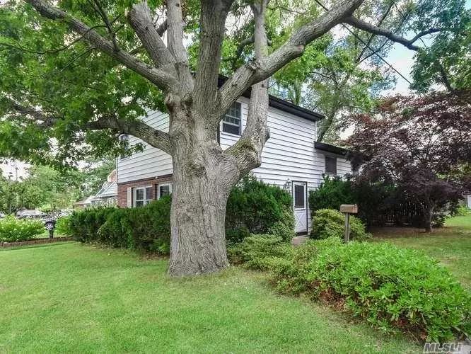 Great Opportunity to own a 4-Bedroom, 3 Full Baths Split Level In Manhasset Isle. First Level LR, DR, Kitchen, Cherrywood Cabinets, Viking Stove & Hardwood Floors. 2nd Level offers 2 Bedrooms + Full Bath. 3rd Level w/large master bedroom w/bath, + 4th Bedroom. Lower level Family Room+ Full Bath, Basement, Laundry , off-street parking for 2 cars,  beach & mooring rights avail w/paid membership. House Sold As Is.