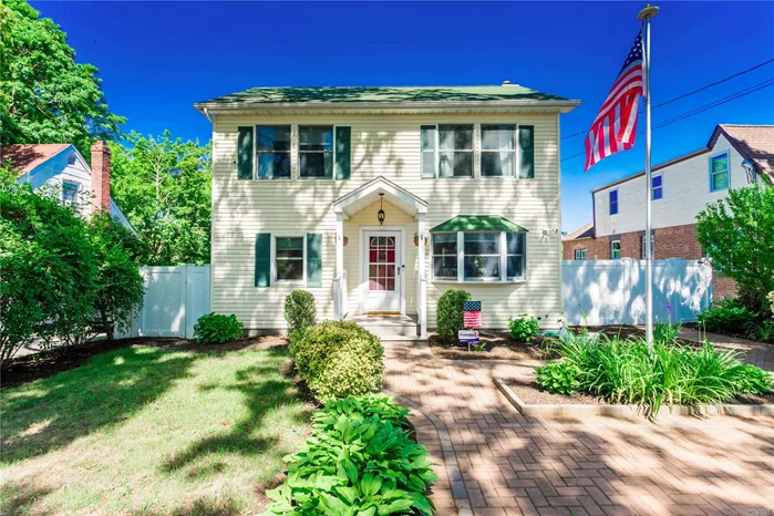 Miraculous Colonial On Oversized Lot. Home Boasts 3 Bedrooms, 2 Full Bathrooms, Full Basement, Updated Kitchen, Formal Dining Room, Oversized Yard W Bocce Ball/Horseshoe Court, Hardwired Protection Security System, Pavered Driveway & Much More!