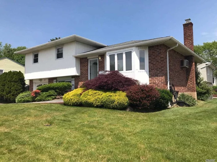 Gorgeous split level home with 3 bedrooms, 2 full baths, a living room, formal dining room, eat-in kitchen, full finished basement and a large backyard. Great location-close to all.