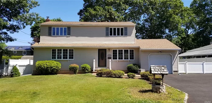 Very Lovely Colonial, Anderson&rsquo;s, New Roof June 2020, Large Kitchen Maple Cabinets, Formal Dining Room, Living Room, Full Bath, Den & another large room. Att garage w freshly paved driveway & access to outdoor patio. Wide Stairs lead to Washer Dryer area & a full finished basement. Second floor features large Master Bedroom, Full Bath & 2 additional Bedrooms. West Islip Schools. Property is flat, level 80X100. Neat Clean and located Mid Block.