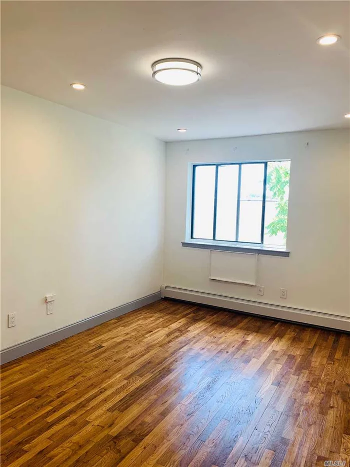 Beautiful and great location approx 1160sf 3 bedrooms 2 full bath with balcony on 3rd floor,  Close to all. Bus transportation in front Q39 Q58 Q54. Subway M train, Minutes to Forest Ave station.