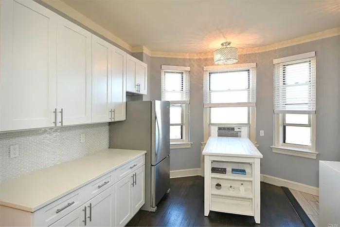 Beautiful, Sunny and Incredibly Spacious With Walk-in Closets. New Kitchen with Movable Island, New Appliances. Low Maintenance $540 Includes Taxes, Heat & Water bills. All Brick, Pre-War Manhattan Style Building Offers Gym, Laundry and Breathtaking Courtyard Garden. Panoramic Views. Commuter&rsquo;s Dream ! Must See !