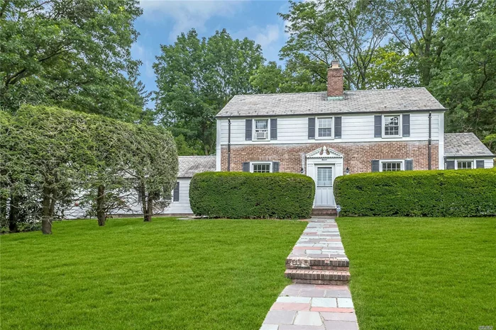 Stately Beacon Hill colonial set on .2478 acres. Four bedrooms four baths, oversize principal rooms. Living room with fireplace and window seat banquet. Beach, mooring and tennis with association. Tennis court at beach.