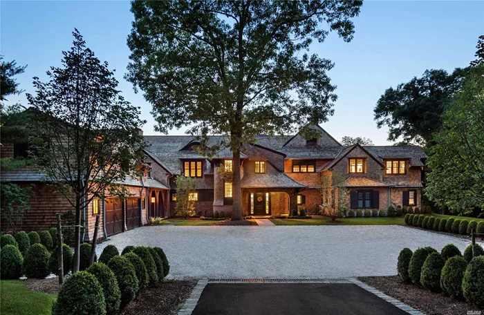 Magnificent Six-Bedroom Waterfront Home on 4.96 Acres This Locust Valley residence has 180 degree views of Long Island Sound w/spectacular sunsets. Built in 2017, this home is a custom design by Hart Howerton Architects. The great room has spectacular water views flooded w/ natural light. French doors lead to a bluestone porch. The library has a double height ceiling & the gourmet kitchen has thick marble countertops & custom cabinetry.The family room features reclaimed wood walls & leads to a three-season porch. The first level also includes a large bedroom suite w/ sitting room. The second level showcases the Master Suite with French doors that open to a private balcony w/ glorious water views. There are 3 additional bedrooms, 2baths & playroom. This property also boasts a one bedroom suite above the 2car garage, heated salt water pool, 5 fireplaces, lutron lighting system, generator & three patios to enjoy breathtaking sunsets. A custom private waterfront home in a premier location!