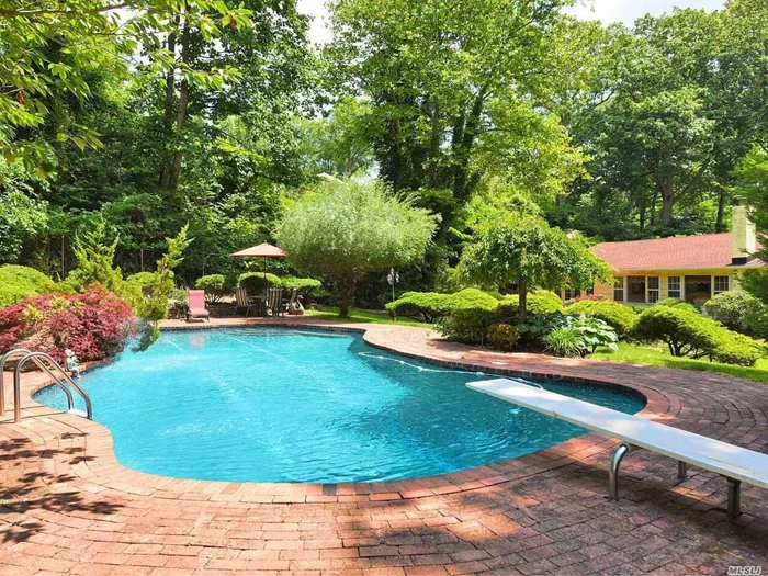 GREAT OPPORTUNITY To Own this FLOWER HILL Sprawling Ranch Set Up High on a Magnificent Lush 3/4+ Acre With Wonderful Curb Appeal .Private Professionally Landscaped Grounds W Gunite In-Ground Pool & Waterfall, Brick Patio & 2 Car Garage. large Walk-out Lower Level. SALEM ELEMENTARY SCHOOL. Close Proximity to Train.