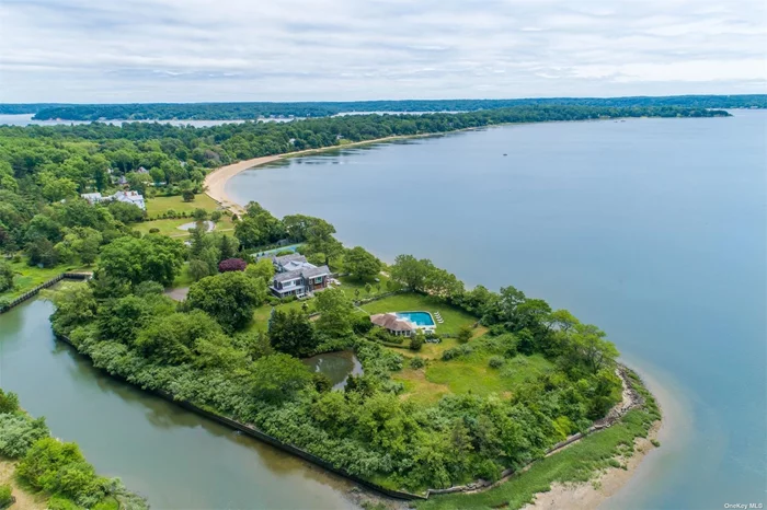 SPECTACULAR 8.71 WATERFRONT PROPERTY WITH NEARLY 1000 SQ. FT. OF OPEN OYSTER BAY HARBOR DIRECT WATER.SURROUNDED BY A 75-FT BOAT BASIN. THIS TROPHY RESIDENCE BOASTS ARCHITECTURALLY DESIGNED LANDSCAPING AROUND THE ENTIRE PROPERTY INCLUDING THE NEW TENNIS COURT, POOL, LG. POOL HOUSE, SPA & A 120 YD PAR THREE! ALONG WITH GEO-THERMALLY SUPPLIED IN-FLOOR RADIANT HEAT AND COOLING SYSTEMS AND SOPHISTICATED SECURITY THROUGHOUT, OFFERING A LUXURIOUS LIFESTYLE IN A MAJESTIC WATERFRONT SETTING.