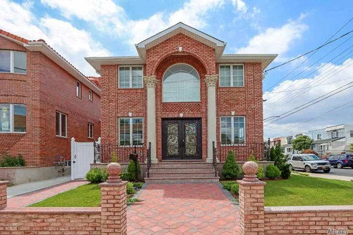 One of kind rare find newly rebuilt with high quality materials 2 Families house, chef gourmet kitchen equipped with top of line appliances, central A/C, camera security system, Basement Separate entrance. prime location near P.S. 159, Bayside High School.