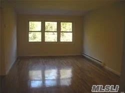 Bright and spacious updated 3 bedroom, 2 bathroom apartment on third floor. Heat and cooking stove are electric. Thermostat for heat in each room. Tenant pays for electric and heat. Landlord pays for water. Shared washer dryer in basement. Hardwood floors. Cats and small dogs welcomed. Street parking.