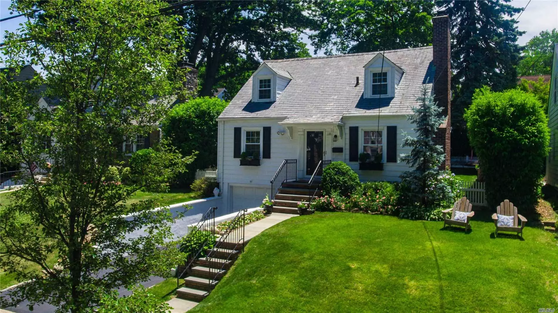 Beautiful home in the heart of Manhasset with a private, flat landscaped backyard. Sunny and bright with many updates and improvements since purchased. Updated white kitchen with granite and stainless steel appliances. Flexible layout with 3/4 bedrooms and 2 updated baths offering master on main or second floor. Close to shops, train and Northern Blvd.