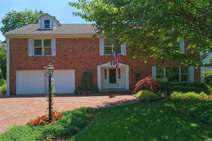 Handsome 5 bedroom colonial with spacious rooms throughout. Large entry foyer with two walk-in closets, formal living room, sun drenched dining room overlooking the private landscaped yard, EIK with timeless cabinetry, high end appliances, Gaggenau dishwasher, and sliding doors leading out to the deck. Laundry conveniently located right off the kitchen. Corner family room with fireplace and custom millwork mantle. . Master en suite with soaking, separate shower and double sinks, 4 additional bedrooms, one of which is custom designed as a home office. Attached 2 car garage. Move-in ready for the Summer!