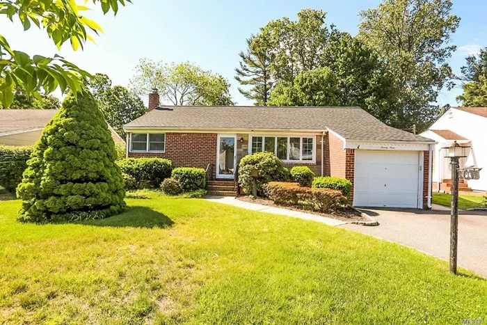 Immediate Occupancy. Mid-Block Brick Ranch. Light-filled Living Room opens to Formal Dining Room with Andersen Sliders to Backyard. Eat-in-Kitchen. 3 Bedrooms, 2 Full Baths. Backyard includes a Sunroom. 1-Car Garage and Extra Wide Private Driveway. Hardwood Floors, Central A/C, Andersen Windows. LIRR to Manhattan, Parks, Shopping, Restaurants. Owners Grieving Taxes. Don&rsquo;t Miss!