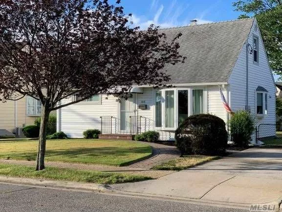 Three bedroom home with gas heat and cooking features updated kitchen and bathroom. Quiet block in Massapequa Shores Sd#23, Immediate Occupancy - Move-in ready! Great starter home or investment opportunity. Close to the park and Area private beach.