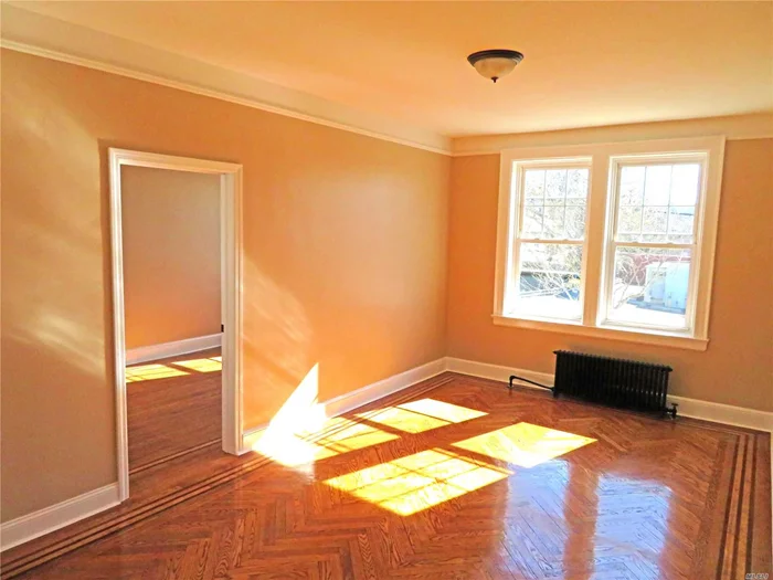 Bright and spacious 2nd floor 2 bedroom, 1 full bath. Beautiful Herringbone Hardwood Floors, Updated Kithchen and Bath. Close to town and train.