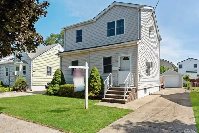 Immaculate 4 Bedrooms, 2 Full Bathrooms Colonial in The Heart Of New Hyde Park. Great Mid-Block Location. From The Entrance Foyer, The Home Offers a Living Room, Formal Dining Room, Eat-In Kitchen, a Bedroom, and Full Bathroom. A Door From The Kitchen Leads to a Relaxing Deck in The Fenced and Private Yard. The Second Floor Boasts 3 Bedrooms And a Full Bathroom. Full Finished Basement for Playroom, A Brand New Gas Boiler (2020), 1 Detached Garage. Close to LIRR, Close to Bus, Close to Park, Near Public Transportation