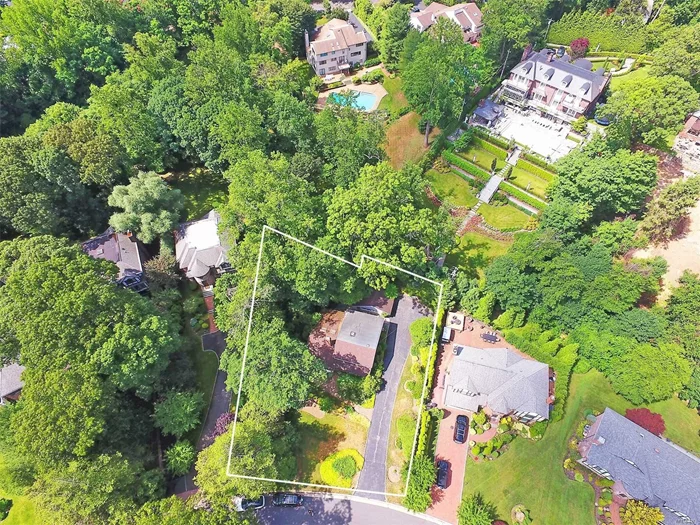 Prestigious location, Strathmore Village, Manhasset!!! Build your dream home on this 0.545 Acre land. This property Well-positioned on a tree-line street. Experience the absolute best of Upscale Urban Living. It is an easy walk to The Strathmore Vanderbilt Private Country Club, and The Americana Manhasset shopping and dining. Manhasset public schools A+ Overall Niche Grade.  LIRR 30 minutes to NYC. Don&rsquo;t miss this rare opportunity.