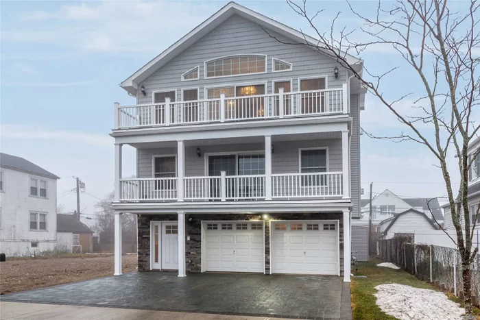 Fully renovated 3 bedroom plus office/den in beautiful new construction home. 3 blocks from the beach & walk to all. Enjoy morning coffee or evening wine on a large balcony with ocean breeze. Working fireplace in the living room. Rental includes parking for 2 cars.