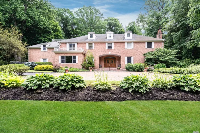 A Gated Entrance Brings You To This Gracious Brick Colonial with Sweeping Lawns in Very Desirable Area. Large Entertaining Rooms with Wonderful Flow. First Floor, Double Height Great Room with Marble Fireplace, 2 Sets of French Doors to Bluestone Terrace, 1st Floor Master Suite with Dressing Room, 2 Walk-in Closets, Spa Bath & Heated Sun Room, Wood-paneled Bookcases in Library/Office with Fireplace & Wet Bar. Large Eat-in Kitchen with Commercial Grade Appliances. Second Floor Open Gallery with 5 Bedrooms, 3 Baths. 4 Acres of Rolling Lawns and Gardens. In Ground Gunite Pool. Heated 3-car Garage. Acclaimed Locust Valley School District #3. Lattingtown Residents Enjoy Lattingtown Beach Rights and Resident Fees for Glen Cove Golf Course. Taxes Reflect Successful Grievance.