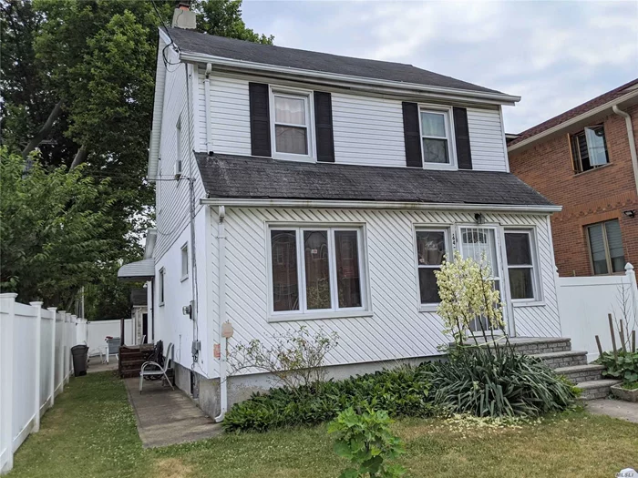 Detached Colonial on a corner lot with R3-2 Zoning! Close to shopping, supermarket, schools and transportation bus Q65 to Main Street Flushing. This home features 3 bedrooms, 2.5 baths and side entrance. Detached garage with private driveway.