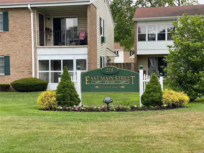 2 bedroom 1.5 bath corner lower unit in East Main street 55+ community with plenty of closets and storage . Master bed with updated 1/2 bath, 2 large closets , Updated Eik, updated full bath. den with attached enclosed patio. 2 new wall ac units.