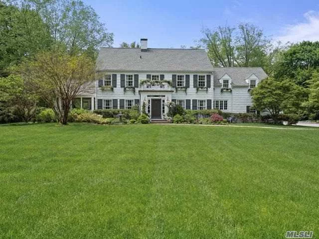 Fabulous 6 Bedroom Center Hall Colonial with Cedar Shake on 2 Beautifully Manicured Acres. Updated Chef&rsquo;s Kitchen w/ Carrera Marble Counter Tops & High End Appliances. Cozy Breakfast Room. Elegant Living Room with Fireplace & Built Ins Leads to Blue Stone Terrace. Spacious Formal Dining Room Perfect For Entertaining. Wonderful First Floor Guest Apartment Addition. New French Drain In Basement, New Oil Burner & A/C, Landscape Lighting. 20 x 40 Heated Gunite Pool w/New Filter & Heater. Outdoor BBQ area. 4 Year Old Roof. Outdoor Pool Shower. Convenient Commuting Location!