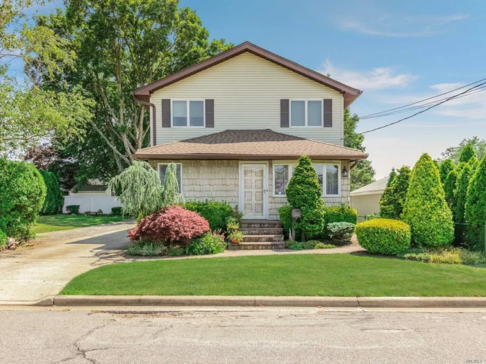 Terrific, Updated, Spacious 2 story cottage style home! Possible Mother/Daughter status with proper permits (M/D permit was previously granted for this property). The 1st floor was recently updated and has a bright, open floor plan. The Living Rm/Dining Rm flow into a beautiful, newly updated kitchen. The gorgeous Kitchen features white cabinetry, stainless steel appliances, quartz counter tops & large Island. Main level also consists of 3 bedrooms and Full bath. 2nd floor includes a full kitchen, Living Rm, 2 Bedrooms, full bath, laundry, covered porch and separate entrance. Well maintained oversized yard with patio and grassy area, great for entertaining! Convenient Detached garage with lots of storage. Updates include, heating, electric, windows, gutters, skylights, New roof, plus much more!