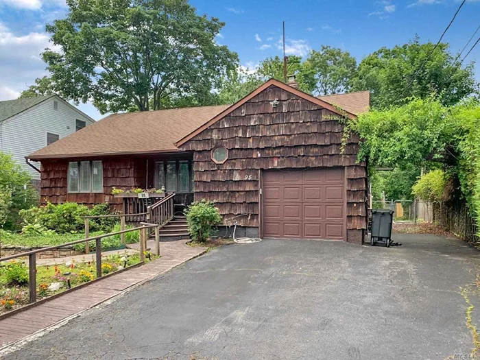 If you are looking for a peaceful haven, simply walk thru this backyard garden and lose yourself! Nice sized Ranch on mid block. House needs updating, but the location to Babylon Village is amazing.