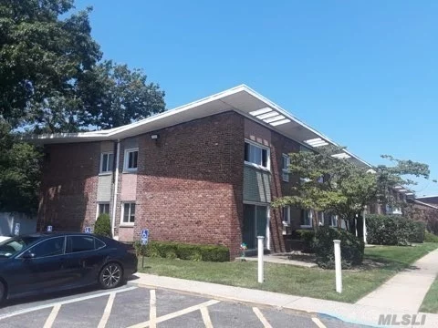 One bedroom apartment on first floor with backyard. East Meadow schools. Basement storage and laundry. Apartment needs update.