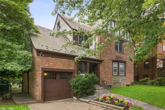 Great Neck. Welcome to this updated Charming Tudor on a quiet tree-lined street. Admire the attention to detail in the living room with it&rsquo;s stained glass windows next to the cozy fireplace, decorative moldings and lovely bay window. Bright eat-in kitchen with stainless steel appliances and granite countertops makes cooking a pleasure. Large den overlooks the patio in the lush fenced in backyard. Head upstairs to a private bedroom off the first landing, continue up to the Master with full bath and 2 additional bedrooms with beautiful custom closets.The hallway bathroom completes the second floor. Amazing location! Close to Long Island Railroad, shopping, restaurants, park and town.