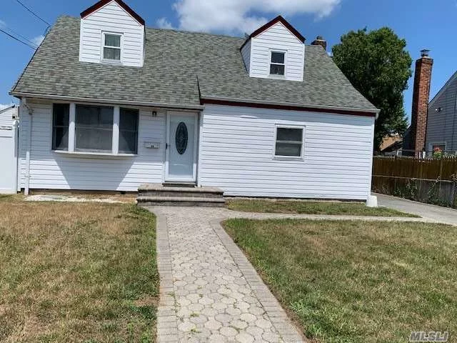 Dormered cape in nice area. 4 bedrooms, 2 bathrooms. Finished basement. Oil heat, gas cooking. Oversized detached garage, close to all, eat in kitchen, nice sized bedrooms, hardwood floors throughout, fenced property, updated kitchen and bathrooms, must see! Call to to see this home today!