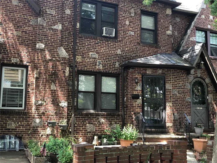 Spacious Tudor in heart of Flushing North. LR, FDR, EIK on 1st floor. 2nd fl: 3 bedrooms and full bath. Finished basement with bath, access to yard. Private yard and detached garage. Hardwood floors throughout.