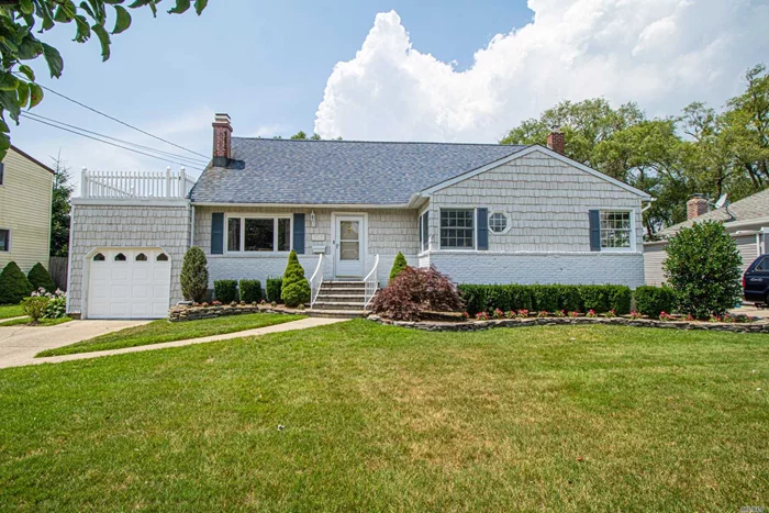 Charming And Spacious 5 Bedroom 2 Full Bath Expanded Ranch Located on A Quiet Street in West Islip. This Home Includes An Open Eat-In-Kitchen With Bay Window Overlooking Backyard, Full Basement, CAC and More!