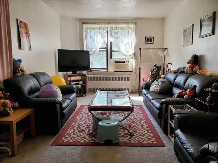 Located Just Off Kissena Blvd., Convenient To Super Market Food/Restaurant And Other Shopping (Around Block), Kissena Park and Hospital. Buses (Q17, Q25, Q34), And Trains (7). Washer/Dryer In Basement. Waiting List For Detached Garage. Bright, Sunny Apartment With Big Windows Everyroom, Lots of Closets!