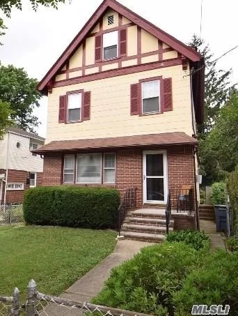 Charming home with wood burning fireplace. Bright & Sunny. 5 Bedrooms. School District 26. Close proximity to LIRR, Bell Blvd., Sacred Heart School/Church, P.S. 41 and Crocheron Park. Zoned R3X - One & Two Family Dwellings