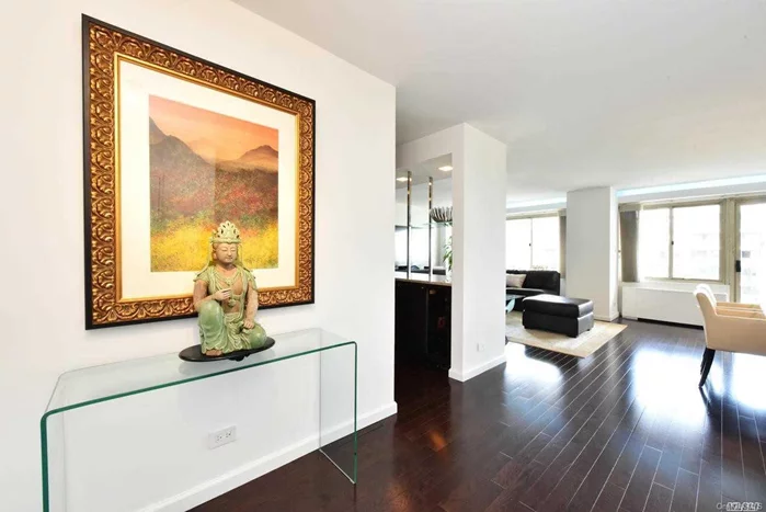 One of kind 1200 sq. ft Largest 1 bedroom with 2 full baths converted from a 2 bedroom. East views of water & west views of Manhattan from the World Trade Center to the George Washington Bridge (five bridges). Enjoy 4th of July fireworks displays from your 20 foot private terrace with trek decking and glass railings. Interior completely renovated, large over sized windows with panoramic views, custom 20 foot long wall of closets in bedroom, walk in closets, wood flooring throughout, kitchen with 8 foot center island, Subzero refrigerator and separate Marvel beverage refrigerator, Viking oven and microwave, and an Asko commercial dishwasher. Bedroom bathroom has a 5x5 shower with white marble and Murano glass tiles. The second bathroom is tiled in Porcelanosa tile. The building includes a 24 hour doorman, 24 hour security, pool, tennis, gym, indoor parking, walk to jogging/bike path along water, boat Marina, park, golf course, Train (LIRR) 25 minutes to Manhattan, express bus and shopping, Additional information: Appearance:New, ExterioFeatures:Tennis