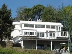 Magnificent Water Views From Each Room Overlooking the Mt. Sinai Harbor, 4000 Sq Ft Light, Bright, Newer Appliances In The Kitchen, Perfect For Entertaining,  Includes Private Par One For the Golf Enthusiast.