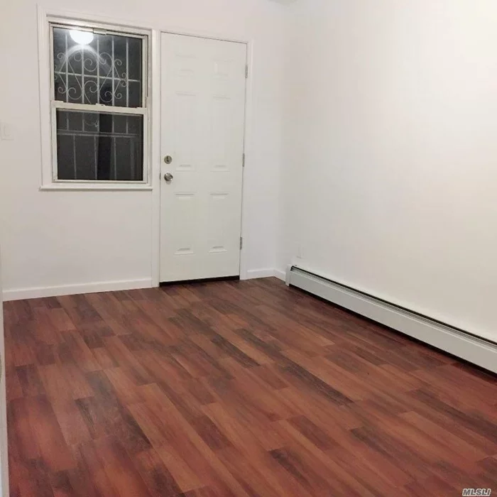 1st floor apartment that features 1 bedroom 1full bath, kitchen, living room and dining room. $1800 water included. Tenant in charge of electricity and gas. Mins of walk to bus station Q88 QM10 QM11 QM40 Q58 Q38. No pets allowed. No washer/dryer/dishwasher. Street parking. Close to LIE & Grand Central & shops.