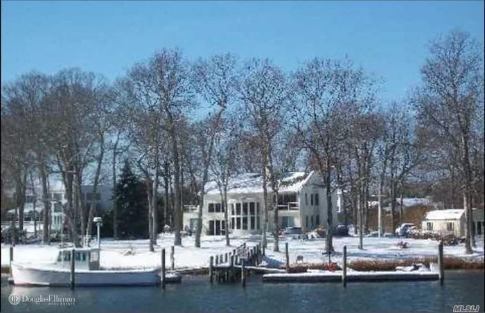 Waterfront, 4 bedroom, 2.5 Bath Contemporary Home Situated On 1.4 Acres. Hurricane Sandy damaged property that was never fixed. Mold and mildew thru out property.  Property is not habitable to live. This is a short sale subject to bank approval by the bank. All Cash only.