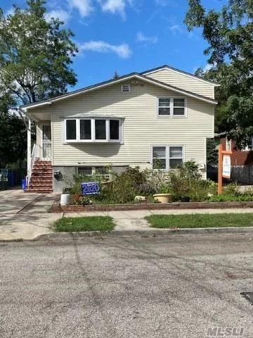 Investors Dream! 2 Family Triplex! 3 Bedroom, 2 Bath apartment plus 2 br 1 bth, lr, kit apt, Large basement area with OSE/Lots of potential, 2 separate driveways, perfect for extended families. Needs updating House Sold as is.