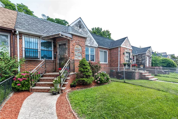 This beautiful English Tudor is sitting on a Tree Lined Street. Its a Masterpiece. 100% Brick. Newly Renovated Bathrooms. Bonus Room in Basement perfect for Guests. Basement has own separate Entrance. Private Driveway. Attached one car Garage.